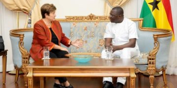 Amin Adam with IMF Boss