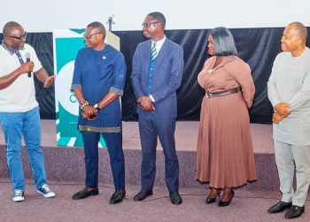 Chairman of the new CFLE Advisory Board, John Awuah [L] in a discussion with fellow board members